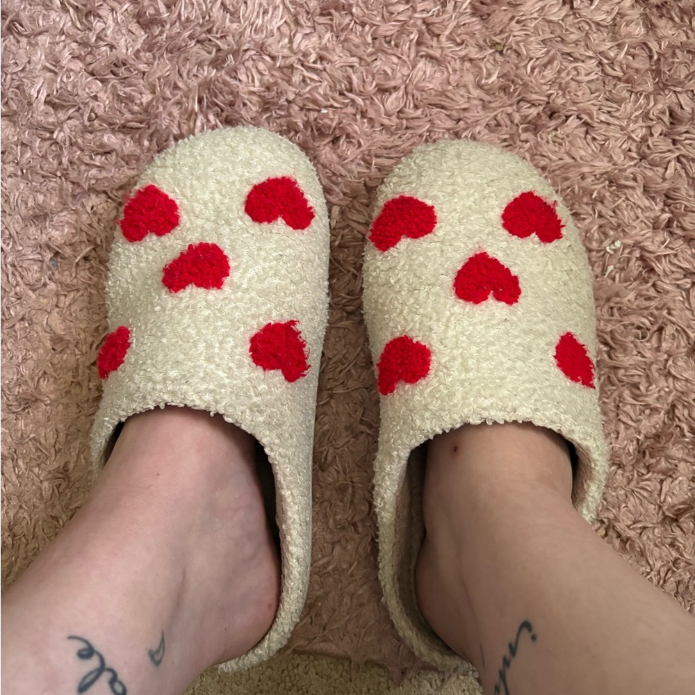 Well Loved Slippers with Red Hearts